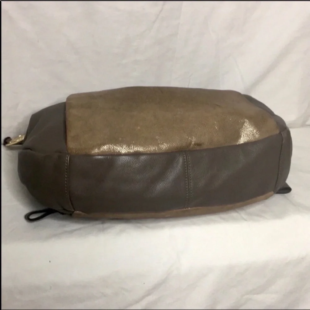 Vince Camuto toupe and metallic platinum hobo
